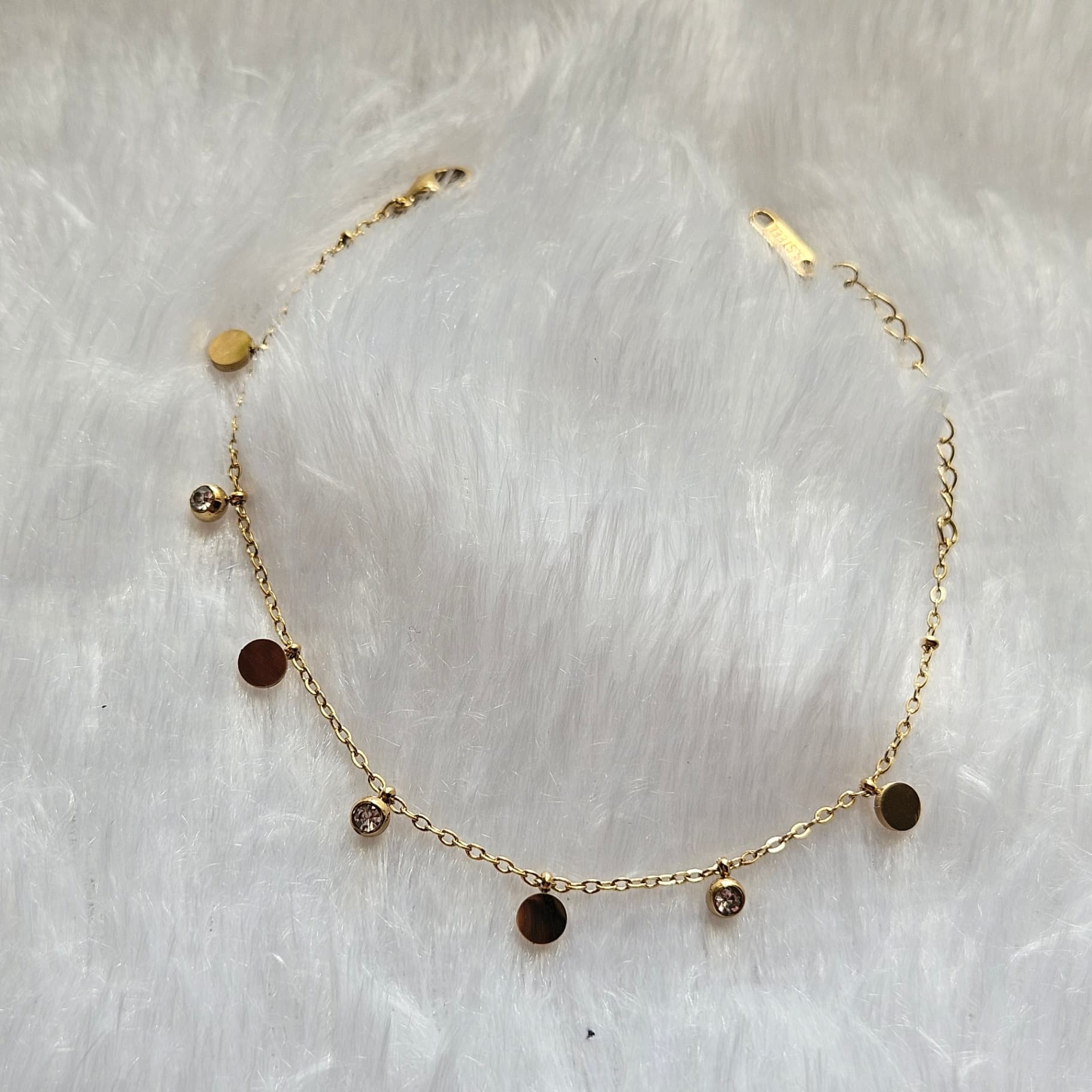 White Stone and Gold Charms Bracelet — image 1